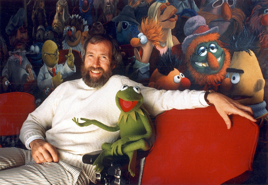 Jim Henson and his creation, Kermit the Frog, sit in front of a mural by Coulter Watt. Jim Henson and his creation, Kermit the Frog, sit in front of a mural by Coulter Watt.